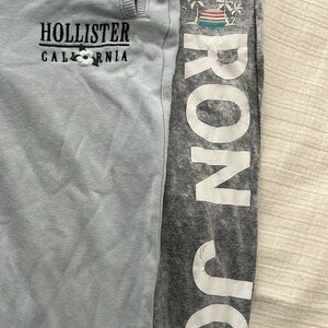 One pair of grey Ron Jon sweats (small)
One pair of baby blue Hollister sweats